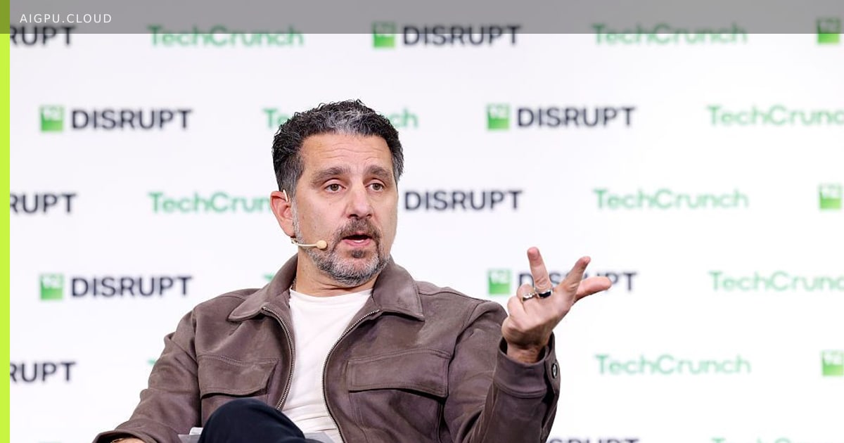 Panos Panay on stage at TechCrunch Disrupt discussing ambient AI wearables