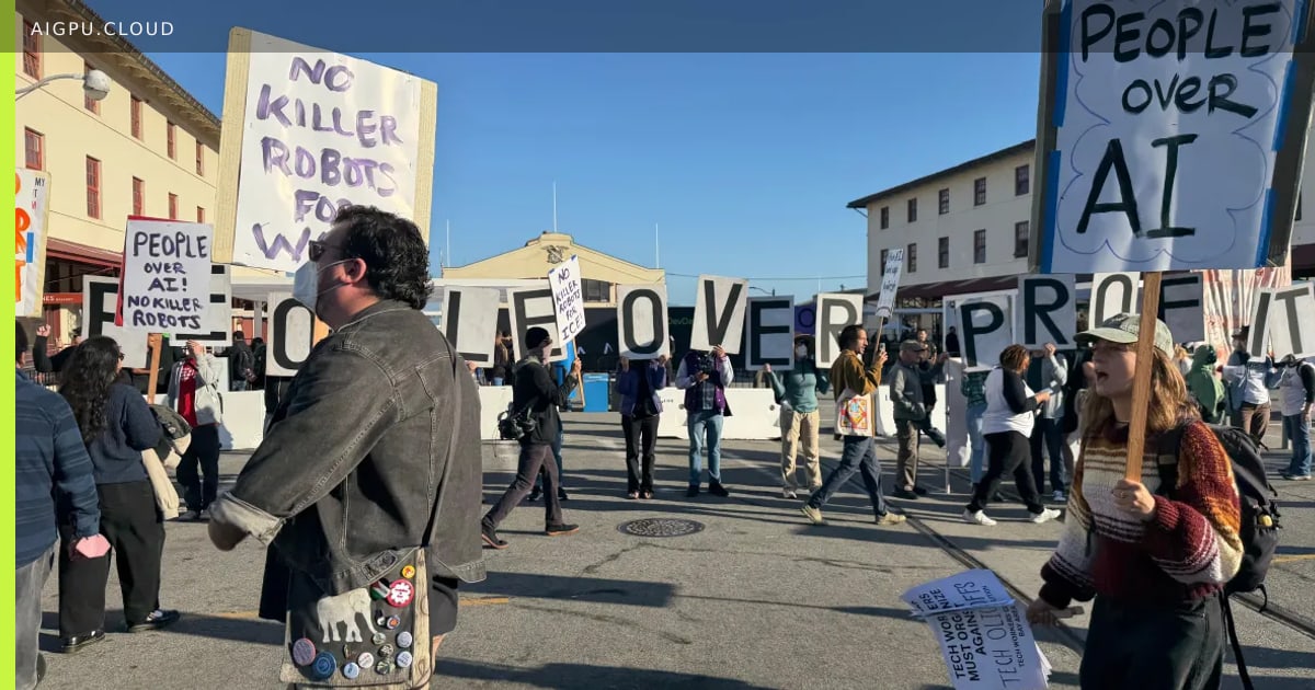 Protesters holding signs outside the OpenAI DevDay event venue